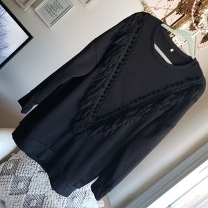 Black sweater dress with fringe